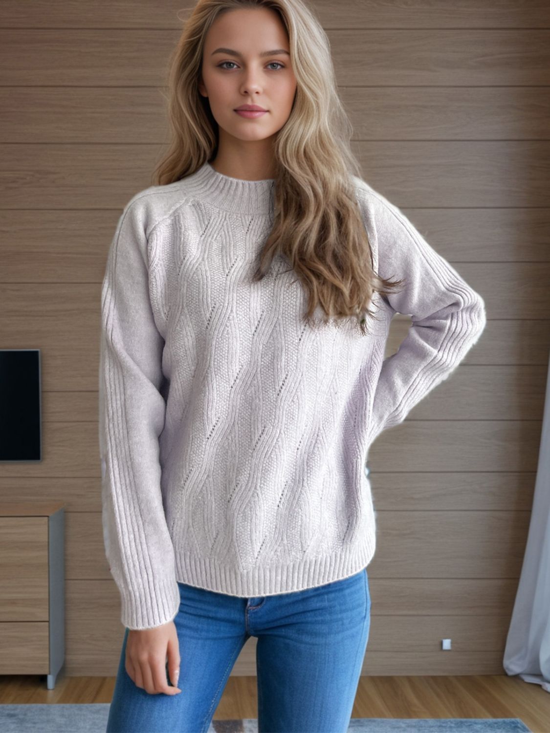 Textured knit raglan sleeve pullover in lilac with diamond pattern and ribbed cuffs.