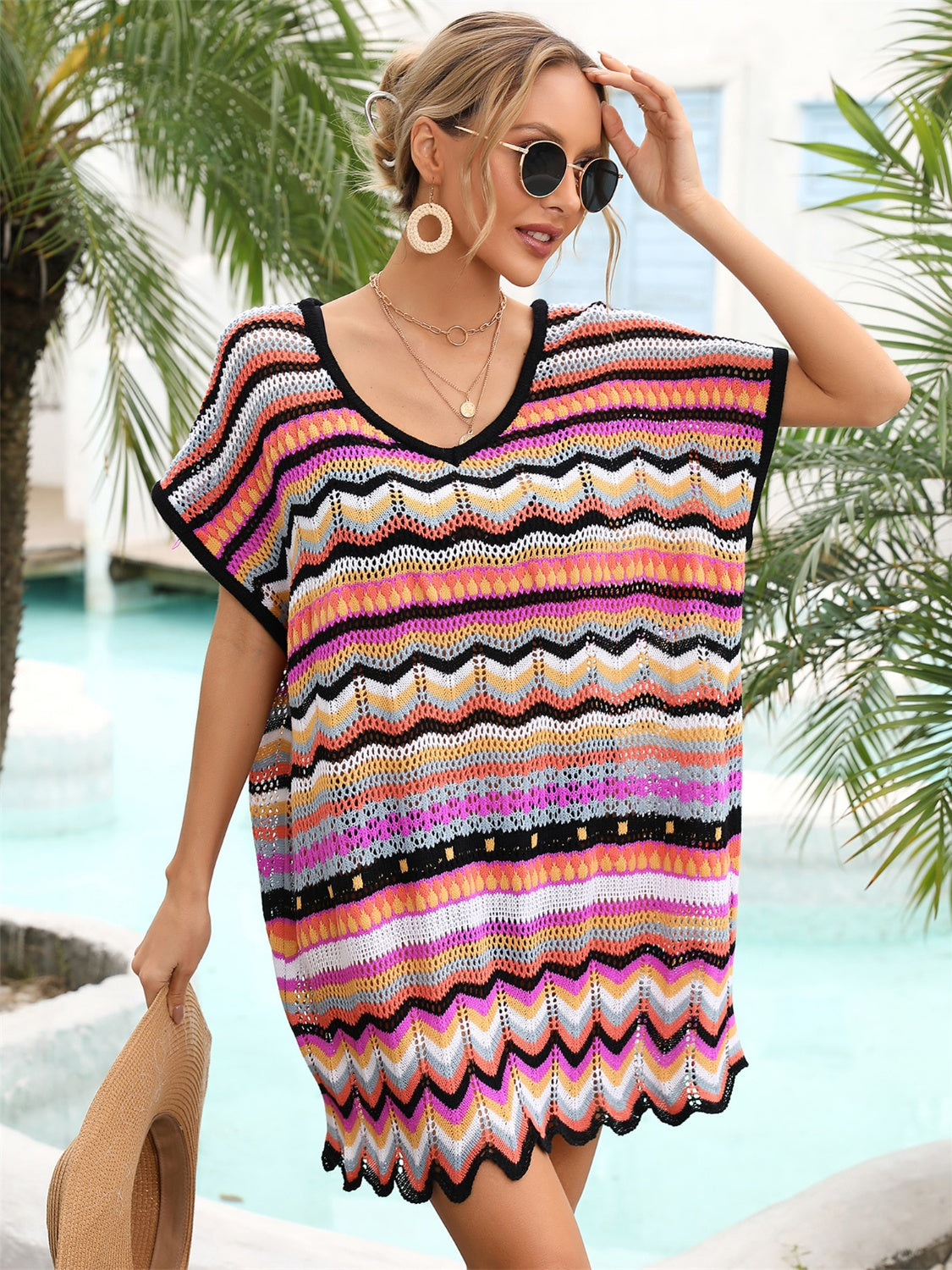 Chevron knit beach cover-up with multicolor stripes and V-neck.