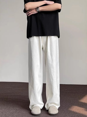 Men's white wide-leg jeans with a comfortable, casual fit.