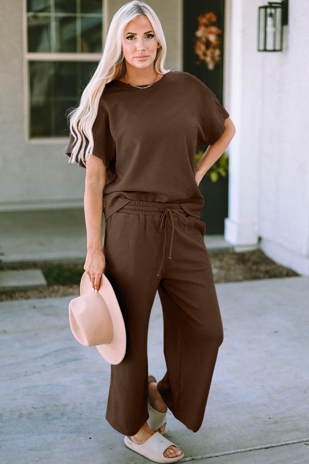 Textured knit tee and wide leg pants set in mocha with drawstring waist and short sleeves.