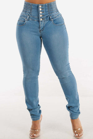 Light wash skinny jeans with a sculpted, button-fly waistband and five buttons.