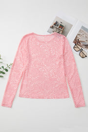 Dusty pink lace second-skin top with long sleeves and a round neckline.