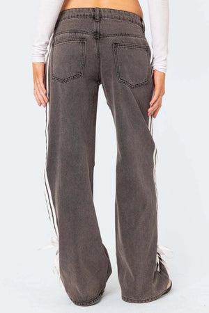 Side stripe wide-leg denim trousers in mocha with white racing stripes and tie detail.