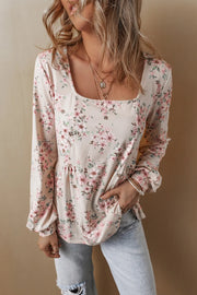 Floral peplum blouse with square neck and long sleeves, featuring a pink floral print.