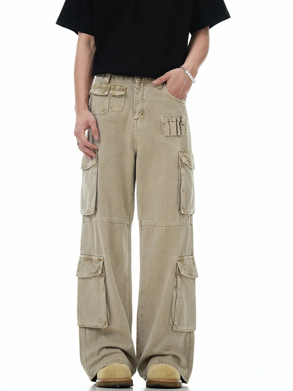 Men's khaki cargo pants with multiple utility pockets and distressed details.