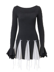 Black mini dress with square neck, long bell sleeves, and a pleated contrast skirt with bowknot details.