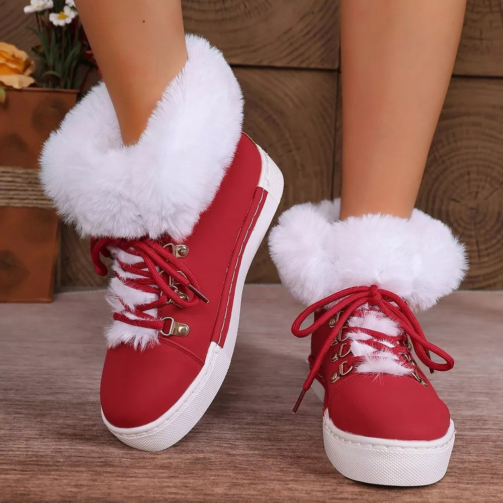 Red fluffy cuff round-toe platform boots with white laces and contrasting white sole.