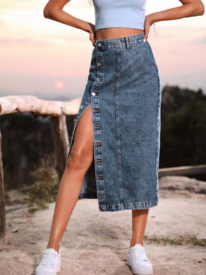 Button-front denim midi skirt in blue with a high slit and button detail.