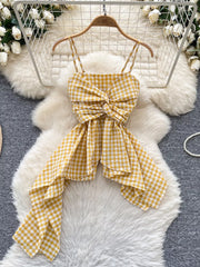 Yellow gingham cami top with twisted knot detail and asymmetrical hem