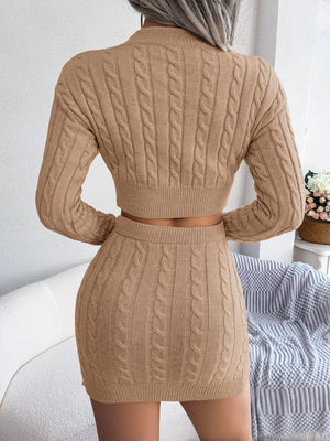 Khaki cable knit crop co-ord set with a mini skirt and long sleeve sweater.