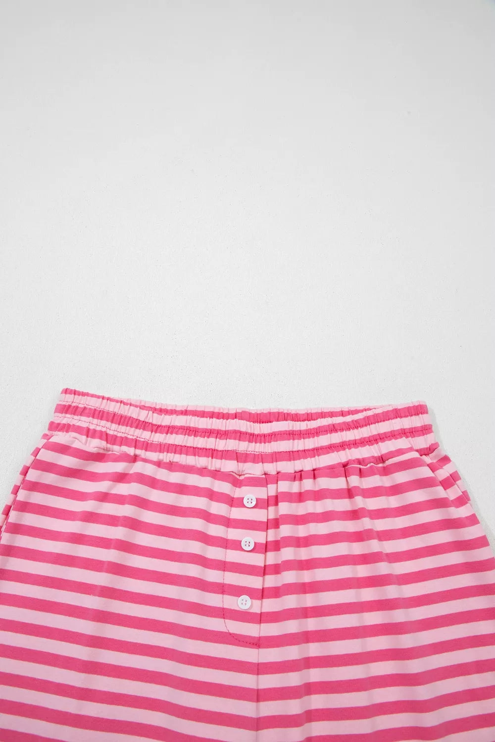 Pink and light pink striped cotton shorts with elastic waist and button detail