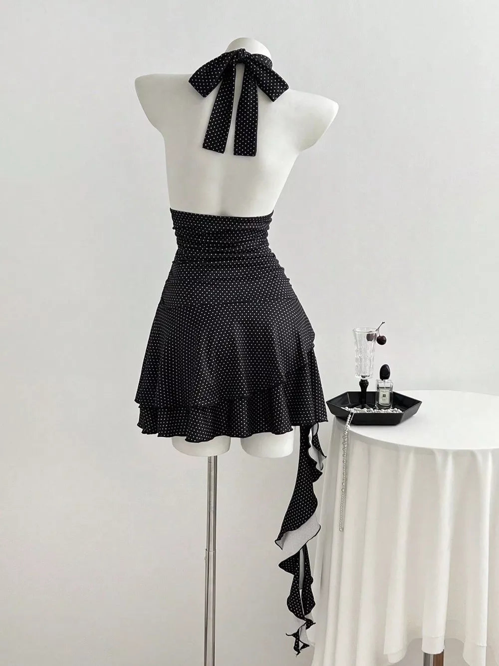 Polka Dot Cutout Front Halter Mini Dress, model styling view