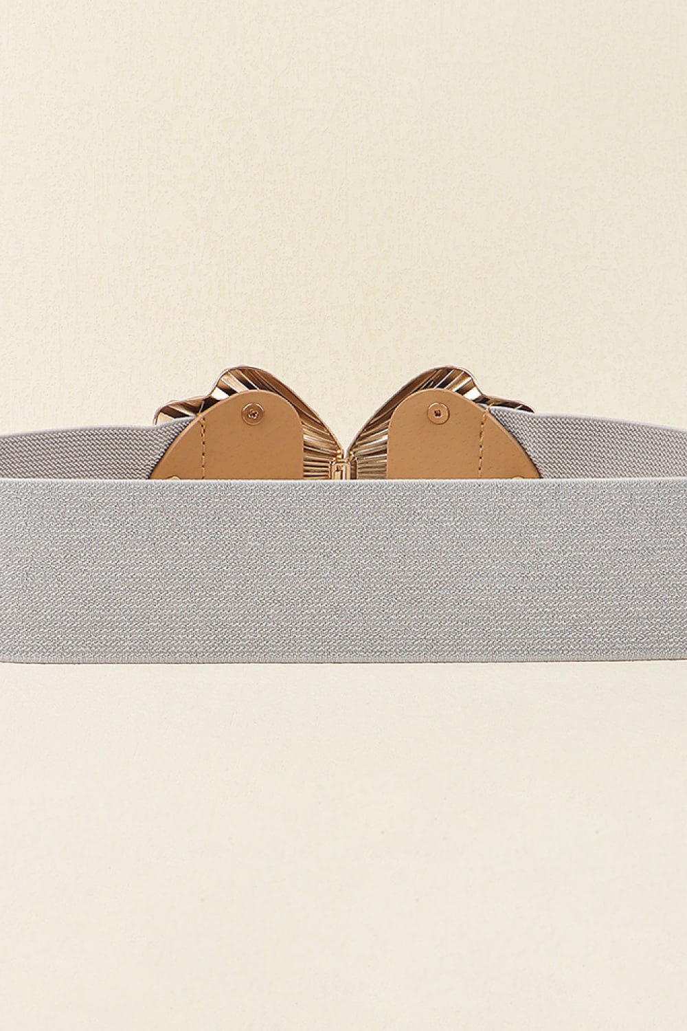 Belt with sculpted butterfly buckle in caramel and silver, grey elastic band