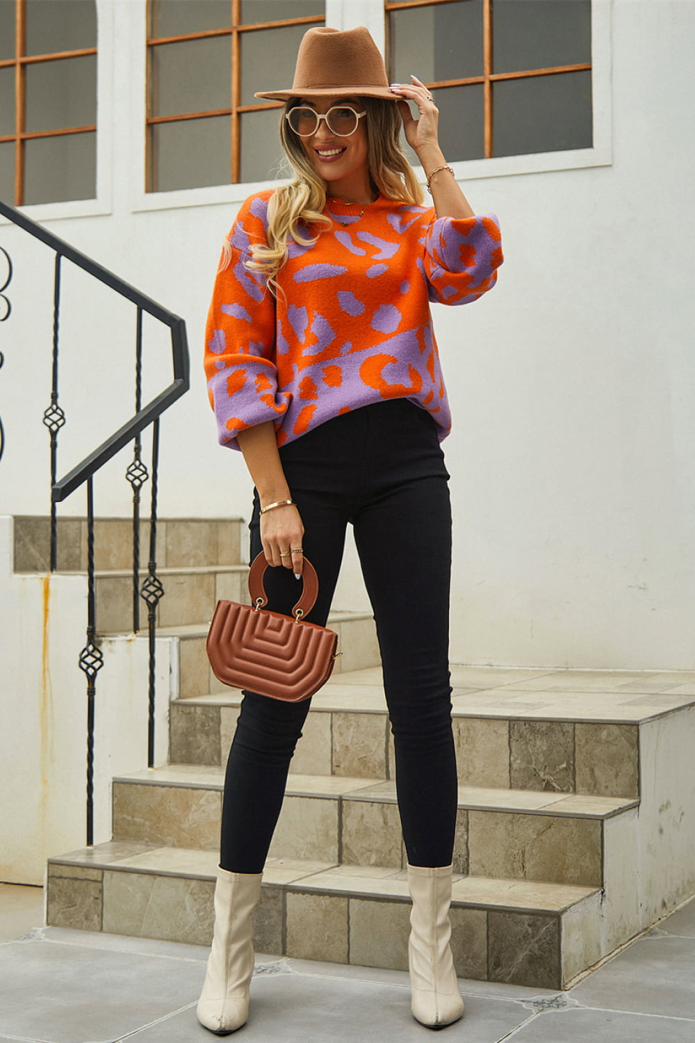 Colorblock leopard knit sweater with balloon sleeves in orange-red and purple, acrylic.