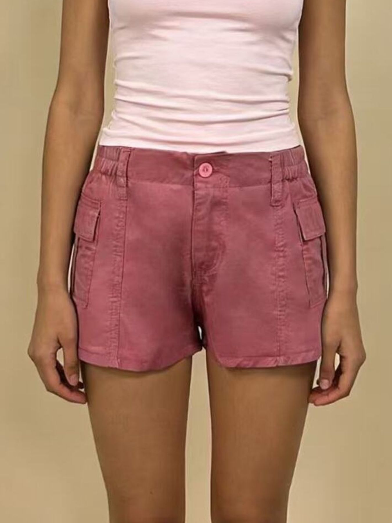 Pink cargo shorts with button fly and side pockets