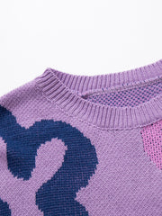 Lavender acrylic knit crewneck sweater with bold navy and pink floral pattern