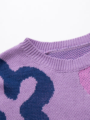 Lavender acrylic knit crewneck sweater with bold navy and pink floral pattern