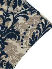 Ornate cap sleeve maternity blouse with notch neckline in a navy and taupe damask print.