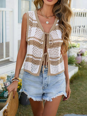 Striped openwork crochet cardigan with tie front and V-neck, styled with denim shorts.