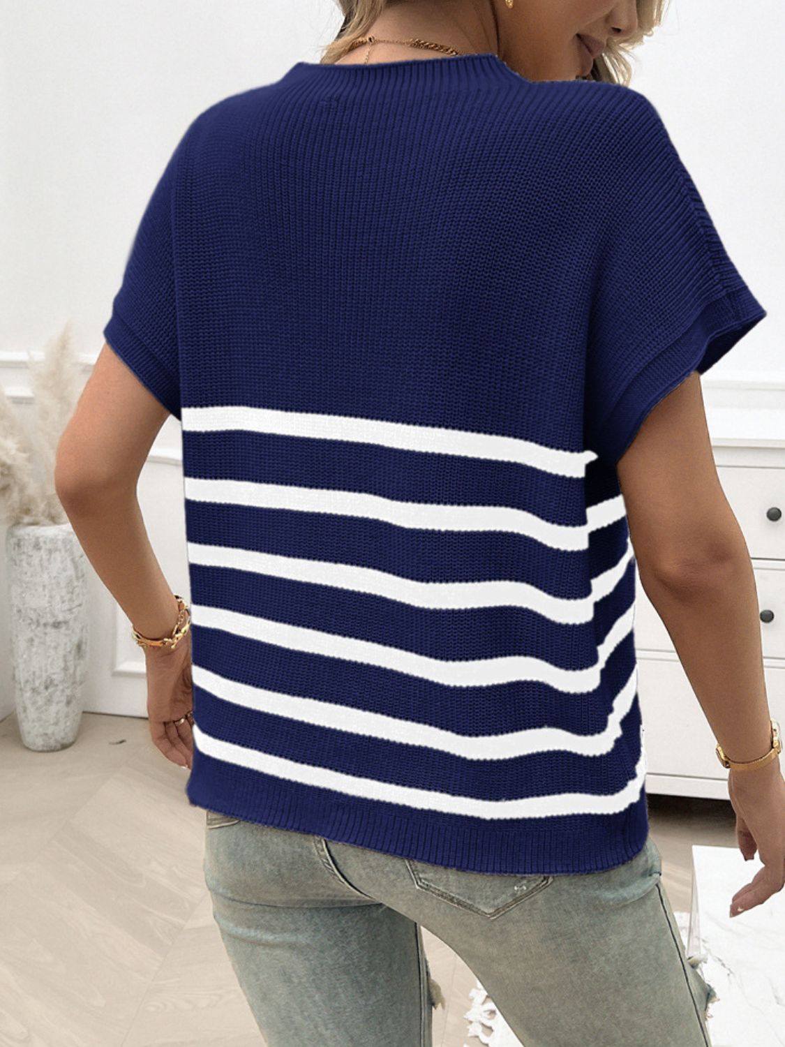 Knit stripe tee in dark navy with white horizontal stripes and short sleeves.