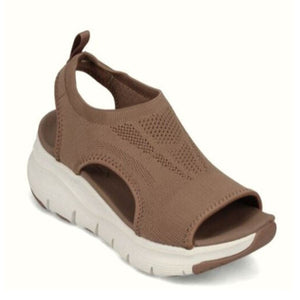 Brown breathable open-toe wedge sandals with a chunky sole and white midsole.