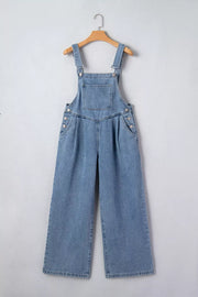 Light wash denim wide-leg jumpsuit with button details and pleated front.