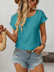 Teal eyelet knit t-shirt with shoulder button details and short sleeves.