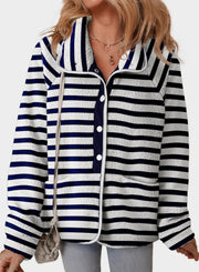 Sherpa button-up jacket with navy and white stripes, collared, and pocket details.