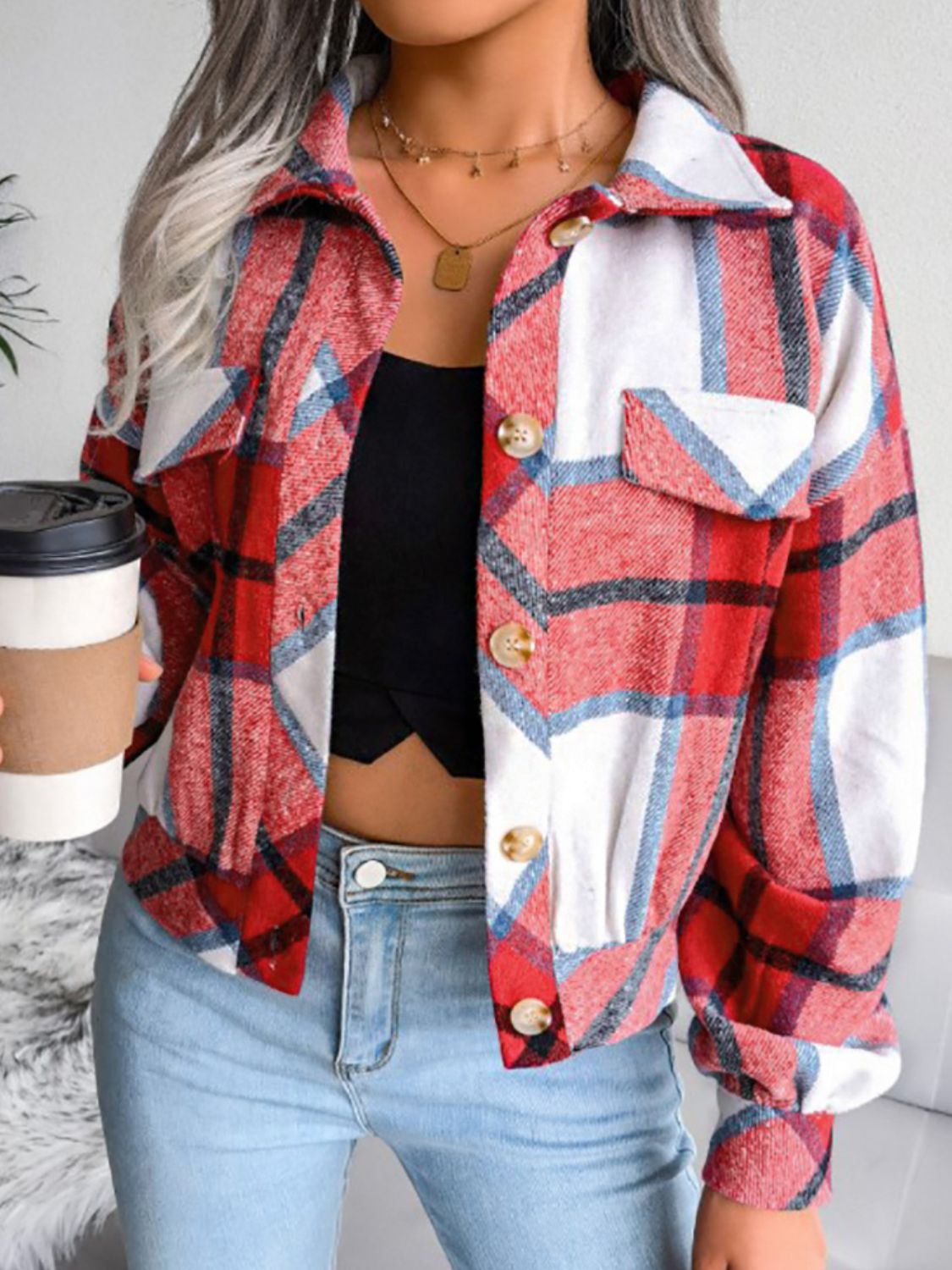 Boxy red plaid shacket with gathered hem, button front, collarless, and chest pockets.