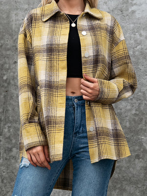 Oversized plaid shacket with patch pockets in yellow and brown plaid.