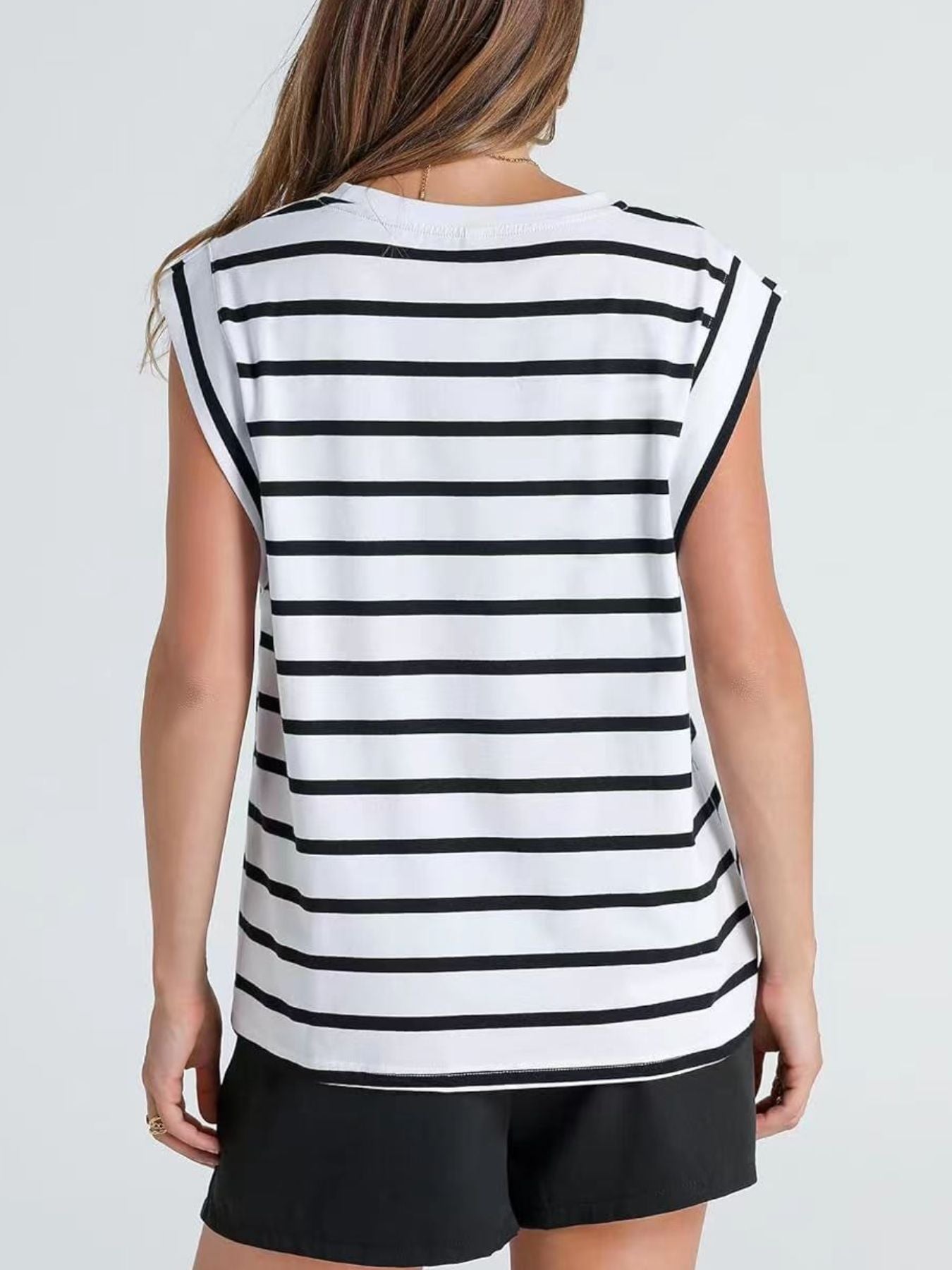 Classic striped sleeveless tank top in white and black.
