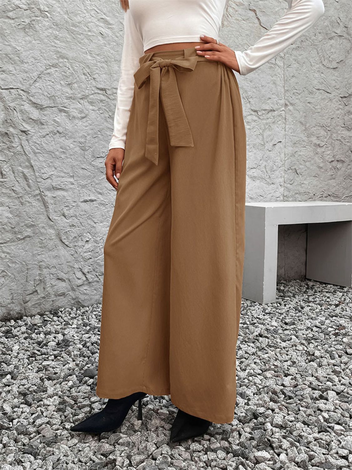 Belted palazzo trousers in caramel polyester with a fluid drape and tie waist.