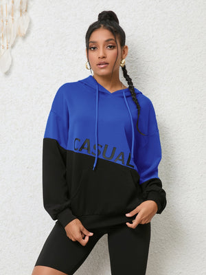 Royal blue and black colorblock hoodie with CASUAL graphic and front pocket.