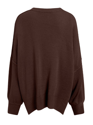 Oversized ribbed knit sweater in chocolate with drop shoulders and crew neck.