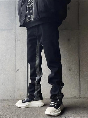 Black cotton bootcut jeans with contrast side panels