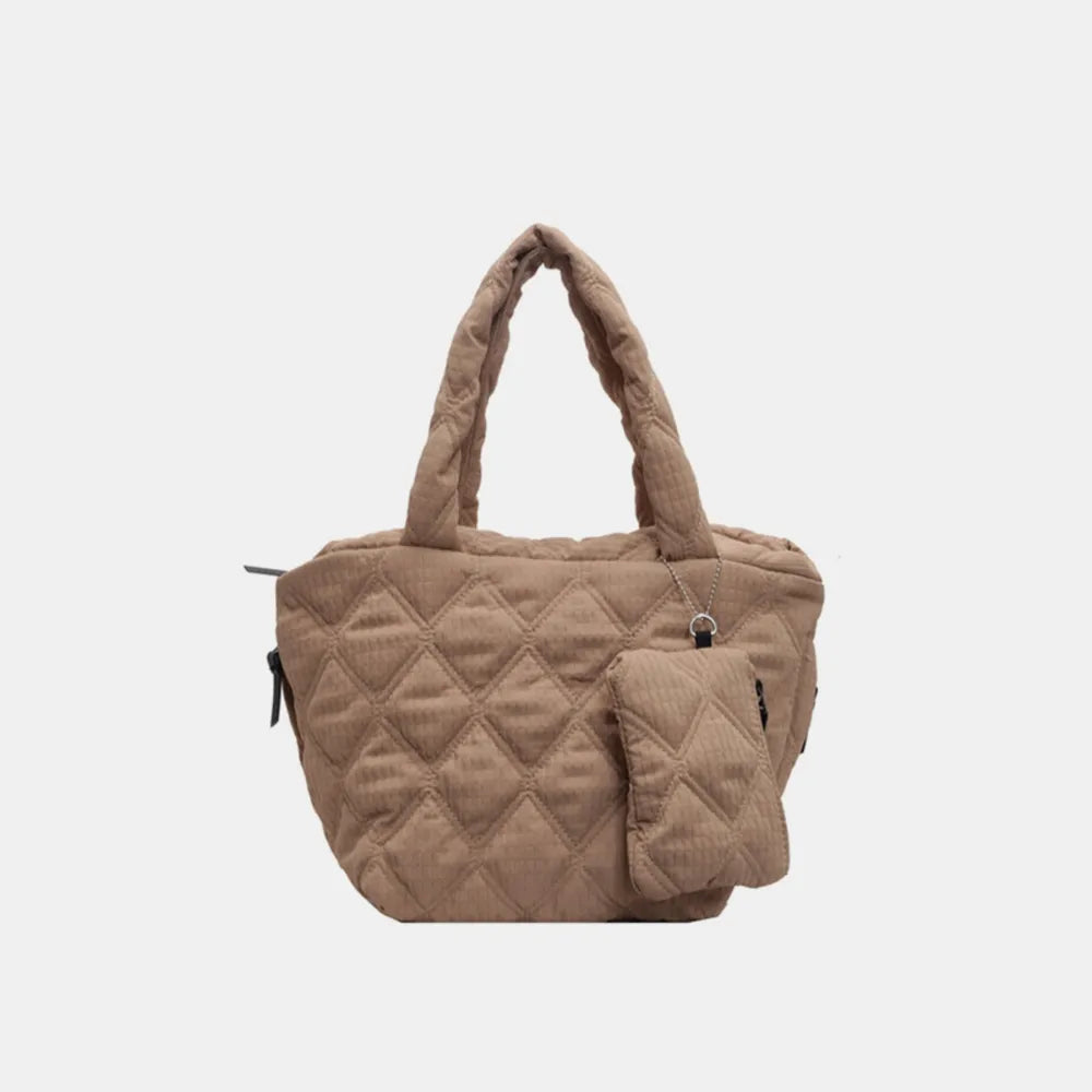Quilted tote bag in camel with diamond pattern and matching coin purse.