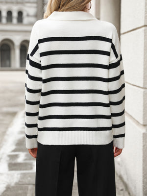 Striped polo-neck knit pullover sweater in white with black horizontal stripes and ribbed cuffs.