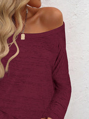 Burgundy heathered knit off-the-shoulder long sleeve top.