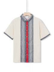 Men's short sleeve shirt in off-white with bold geometric print panel and red placket.