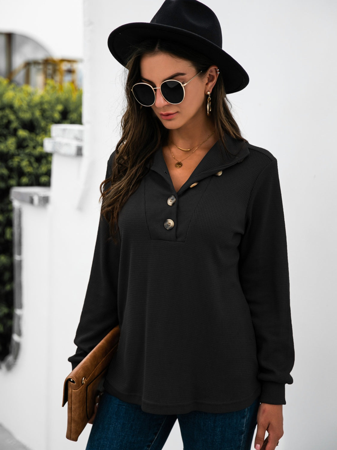 Black long sleeve waffle knit tee with button collar detail