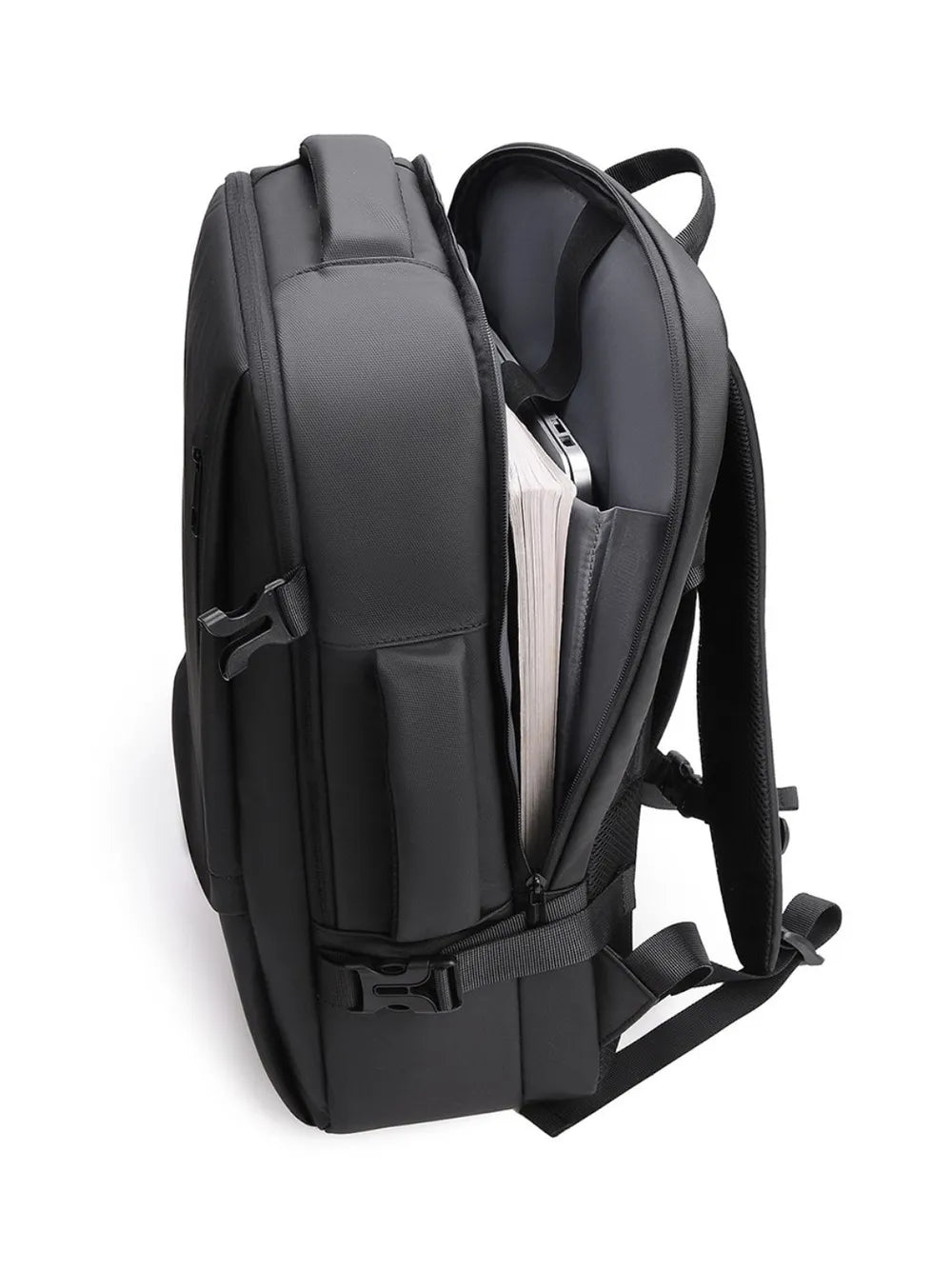 Black convertible commuter backpack with open main compartment showing books and laptop.