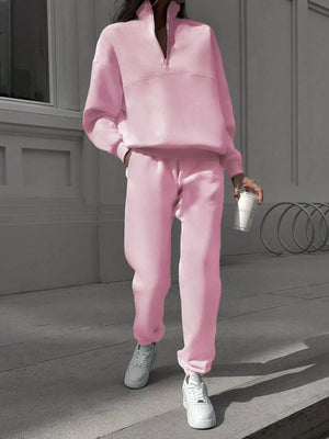 Blush pink half zip sweatshirt and matching pants set, casual athleisure outfit.