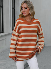 Chunky stripe relaxed fit knit sweater in burnt coral and cream acrylic with crew neck and long sleeves.
