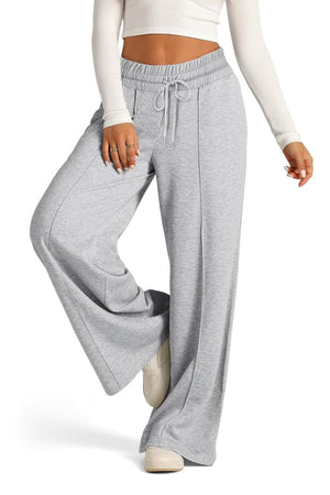 Gray seamed palazzo lounge trousers with drawstring waist and wide legs.