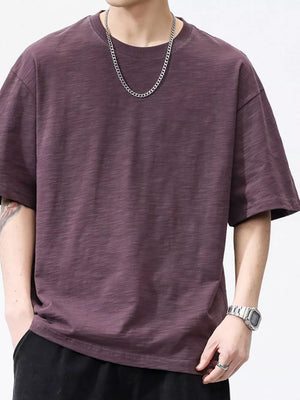 Men's relaxed fit cotton t-shirt in plum purple with a crew neck and short sleeves.