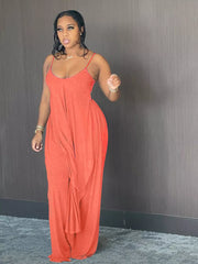 Orange cami and wide-leg pants set with asymmetrical draped hem.