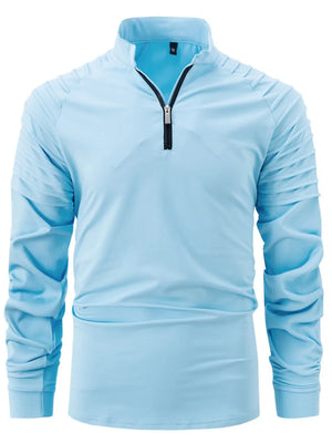 Pleated shoulder zip-neck pullover in Pastel Blue with long sleeves.