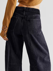 Black frayed hemline palazzo jeans with a wide leg and visible back pockets.