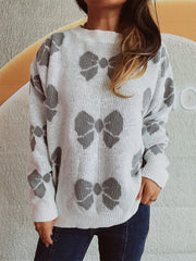 Gray bow print relaxed fit sweater with crew neck and long sleeves.