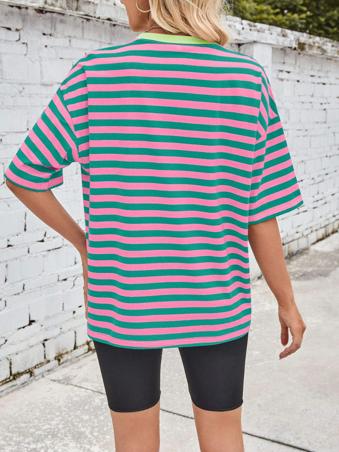 Relaxed fit t-shirt with wide pink and green stripes and a contrast lime green neckline.